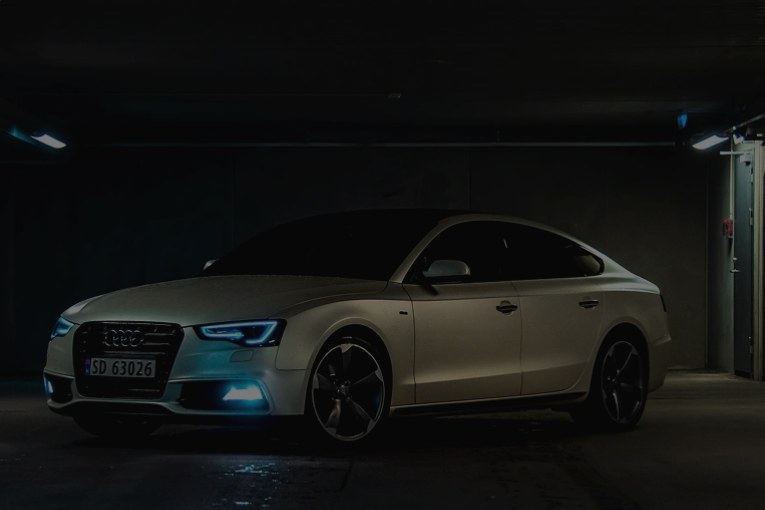 Crownline Atelier work: a car in a dark garage